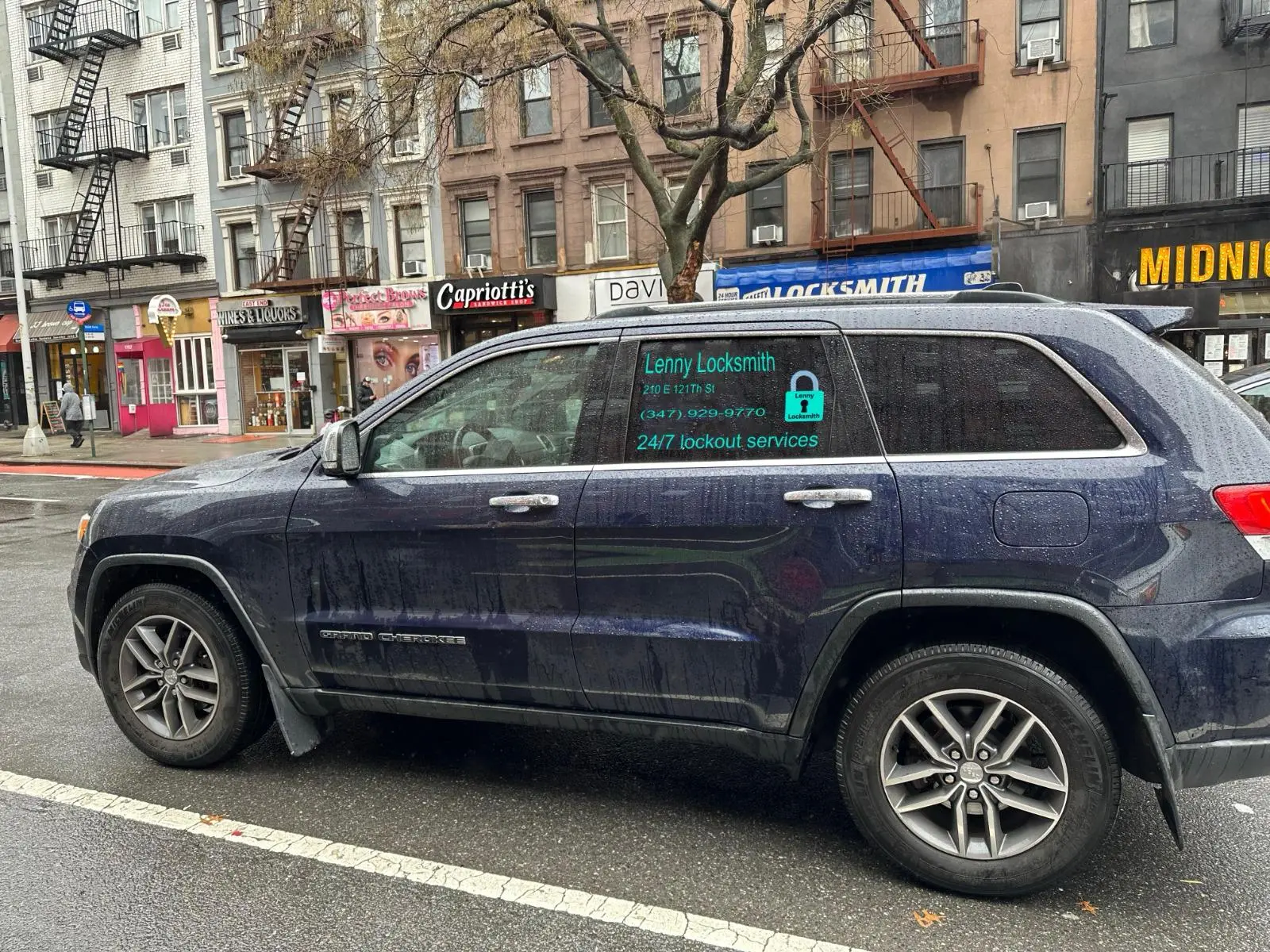 Lenny Locksmith NYC mobile unit - side view with 24/7 lockout branding