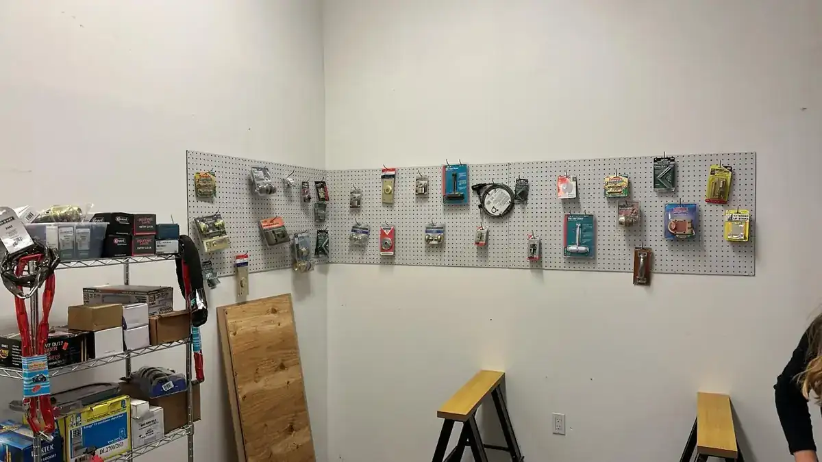 Lenny Locksmith — display wall of residential and commercial locks